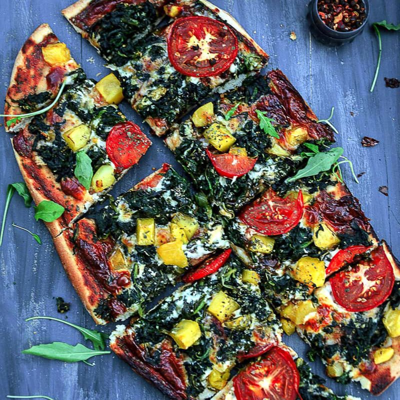 Garlicky Spinach Mango Tomato Pizza