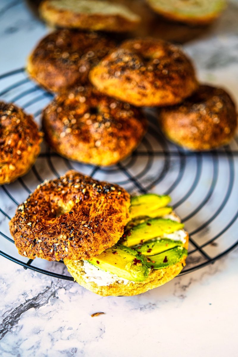 High protein cottage cheese bagel filled with cream cheese and fresh avocado for an easy healthy breakfast.