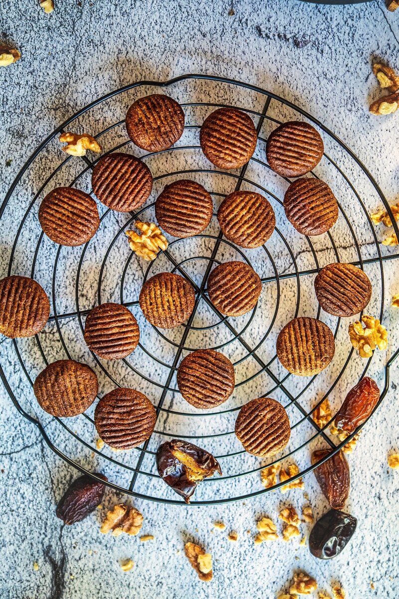 homemade walnut date cookies on cooling rack, healthy 2 ingredient cookies no sugar no butter gluten free