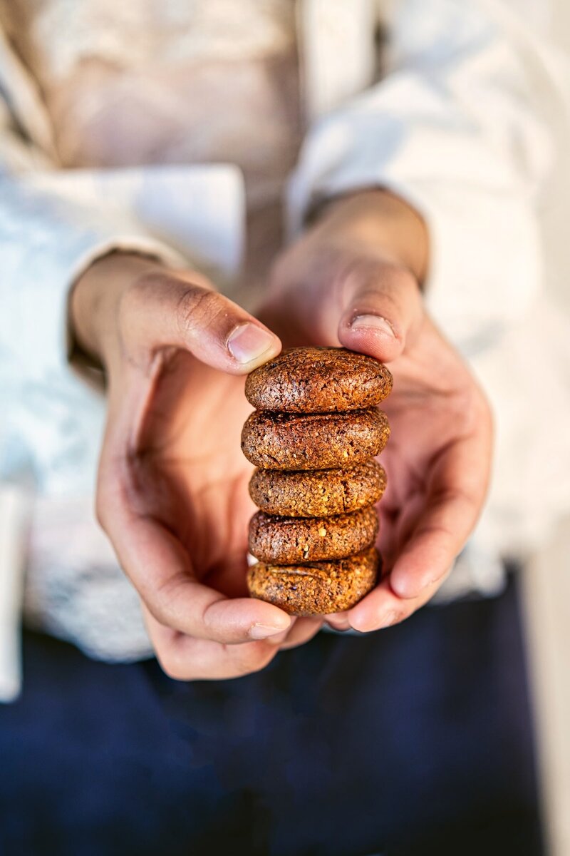 2 ingredient walnut date cookies held in hands, soft chewy healthy cookies no sugar no flour gluten free