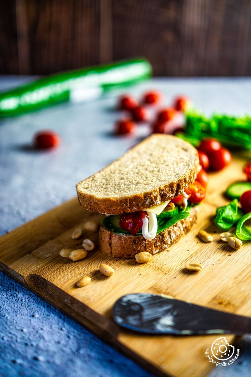 one piece of 2-Minute Veggie Sandwich kept on a wooden board
