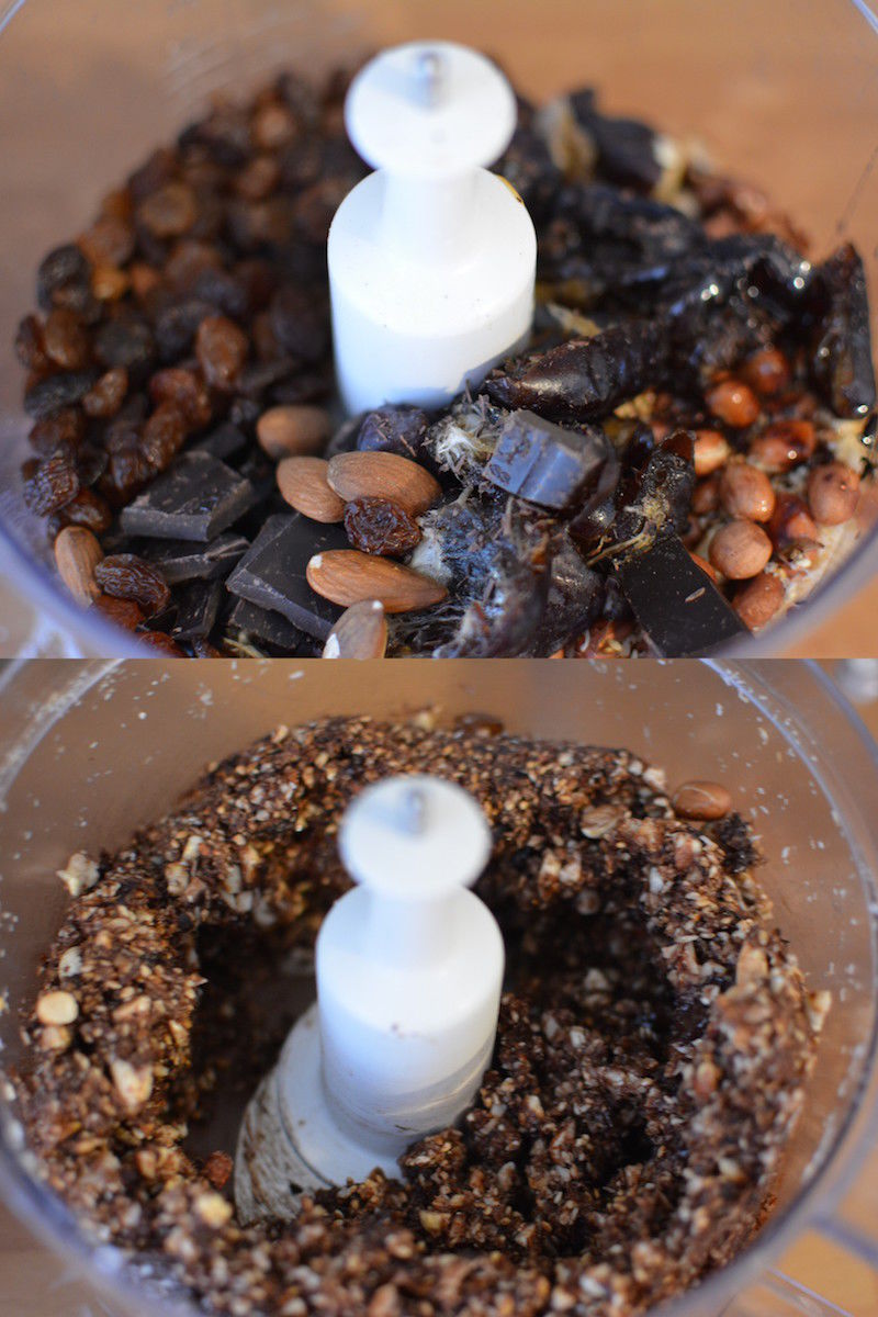 two food processors with nuts and raisins in them