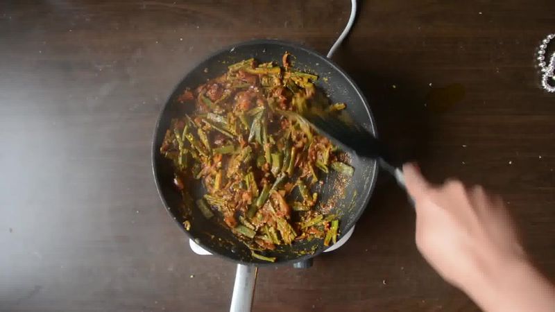 Image of the recipe cooking step-1-12 for Achaari Dahi Bhindi with Duppad Roti - Pad Wali Roti