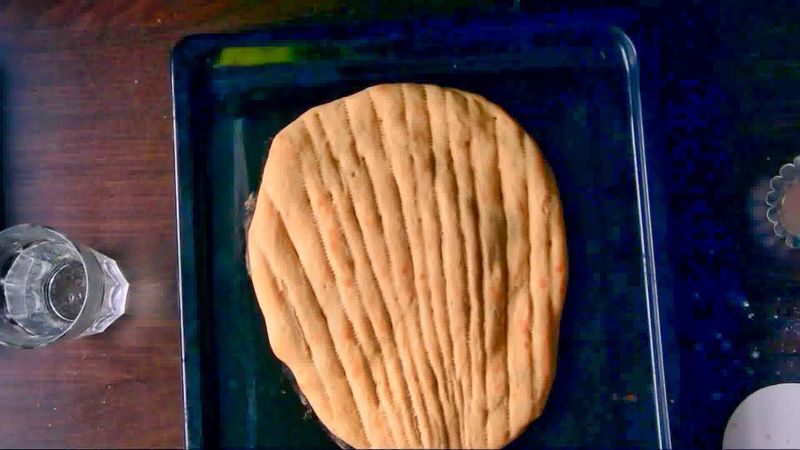 Image of the recipe cooking step-2-8 for Afghan Naan Bread Recipe - Naan-e-Afghani (Video)