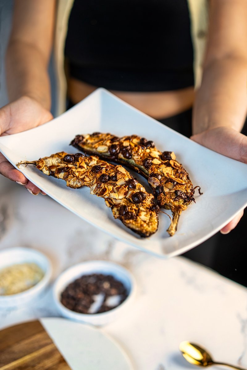 Homemade Air Fryer Banana served on a white plate, ready to enjoy as an easy breakfast, snack, or dessert.