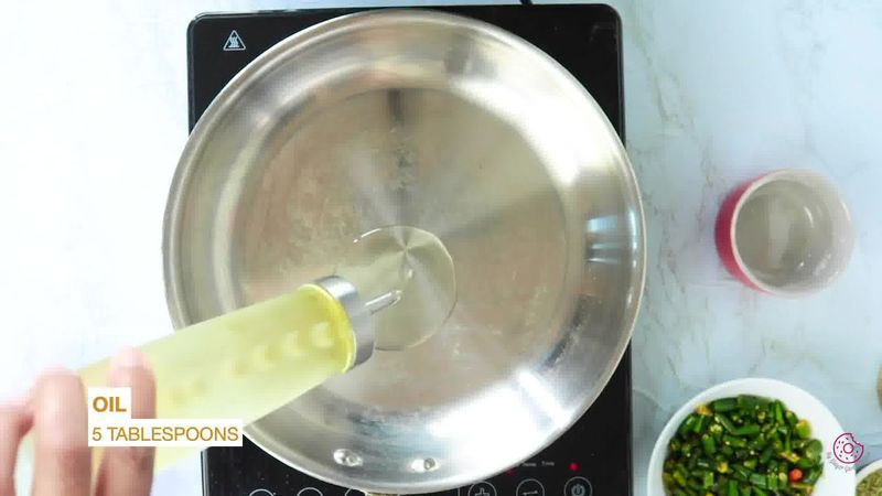 Image of the recipe cooking step-1-4 for Besan Mirchi Ke Tipore - Garm Flour Green Chili Stir-Fry