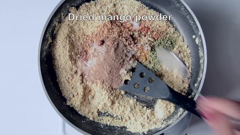Image of the recipe cooking step-2-2 for Besan Stuffed Lauki Curry Recipe - Bharwa Lauki