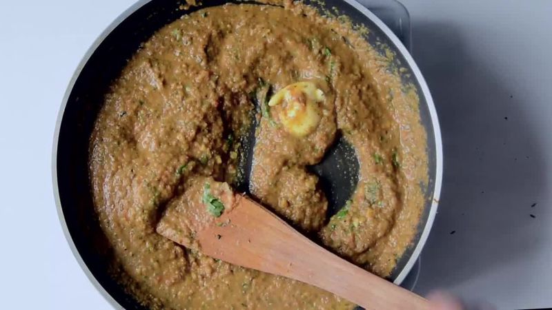 Image of the recipe cooking step-5-7 for Besan Stuffed Lauki Curry Recipe - Bharwa Lauki