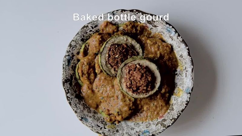Image of the recipe cooking step-6-1 for Besan Stuffed Lauki Curry Recipe - Bharwa Lauki