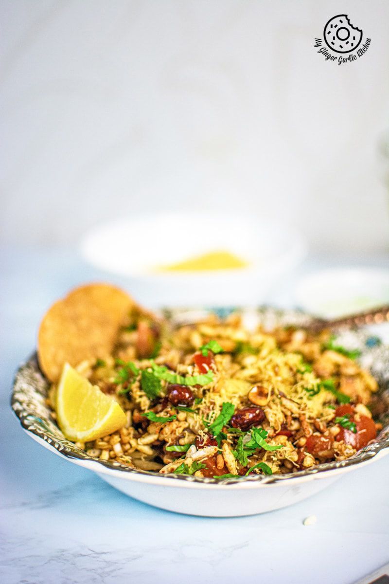 bhel puri served in a floral plate