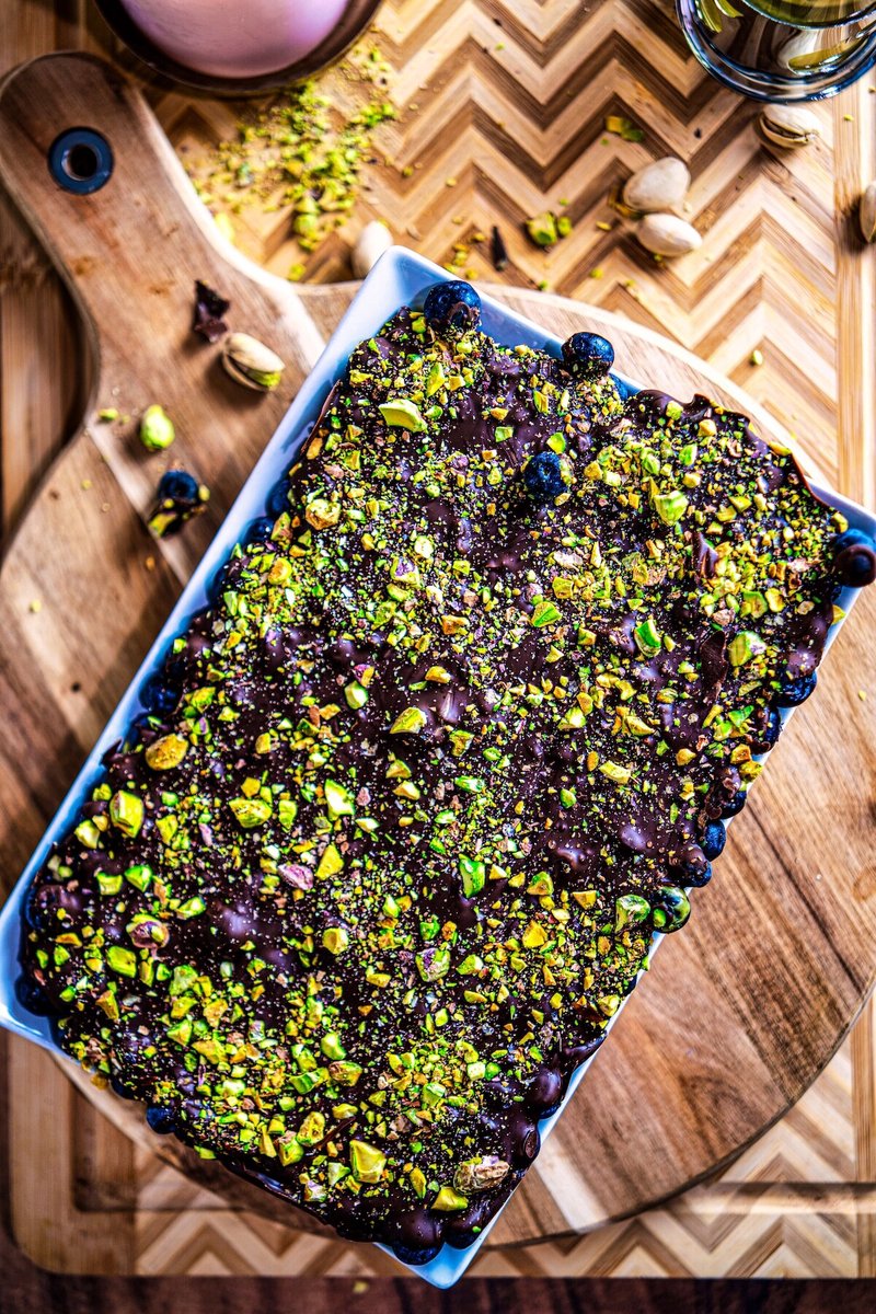 Blueberry Pistachio Chocolate Bark topped with chopped roasted pistachios and dark chocolate, an easy no-bake blueberry dessert made with fresh blueberries.
