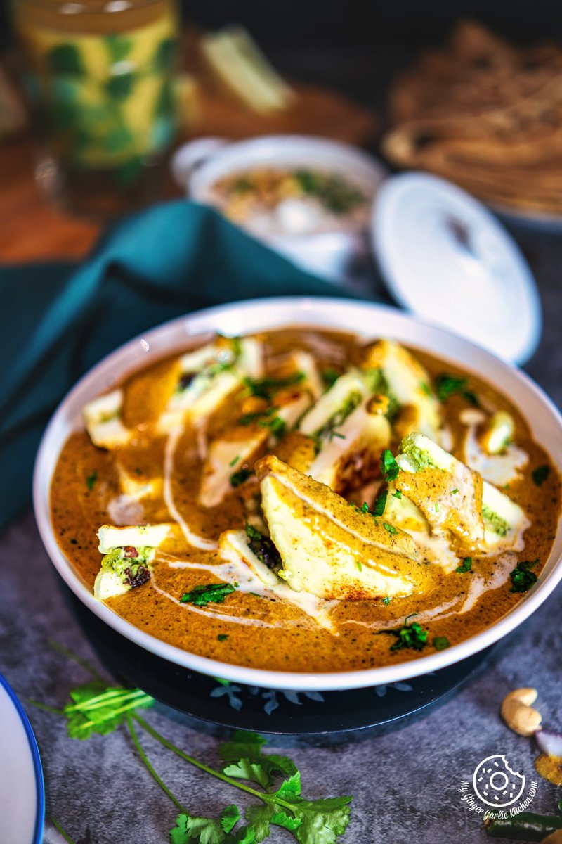 Image of paneer curry topped with cilantro