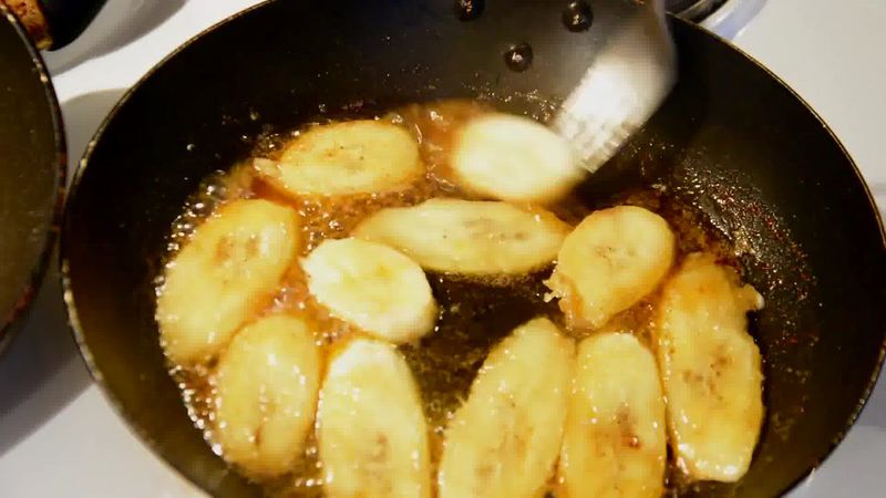 Image of the recipe cooking step-1-5 for Caramelized Banana with Nuts and Mango Yogurt