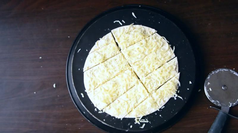 Image of the recipe cooking step-3-4 for Cheesy Garlic Pizza Sticks with Figs Mayo Dip