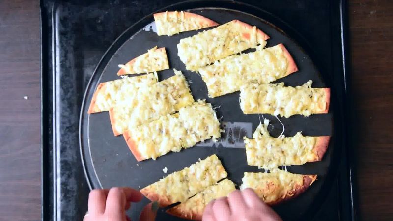 Image of the recipe cooking step-3-5 for Cheesy Garlic Pizza Sticks with Figs Mayo Dip