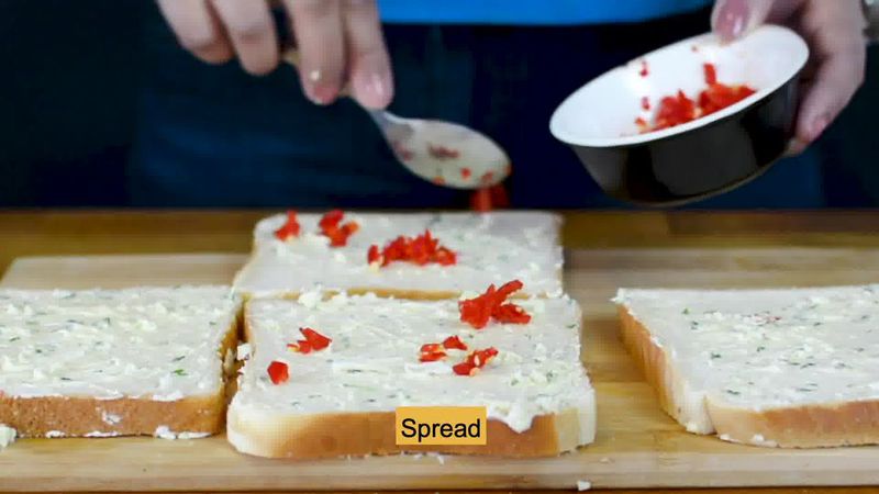Image of the recipe cooking step-2-3 for Chilli Cheese Toast