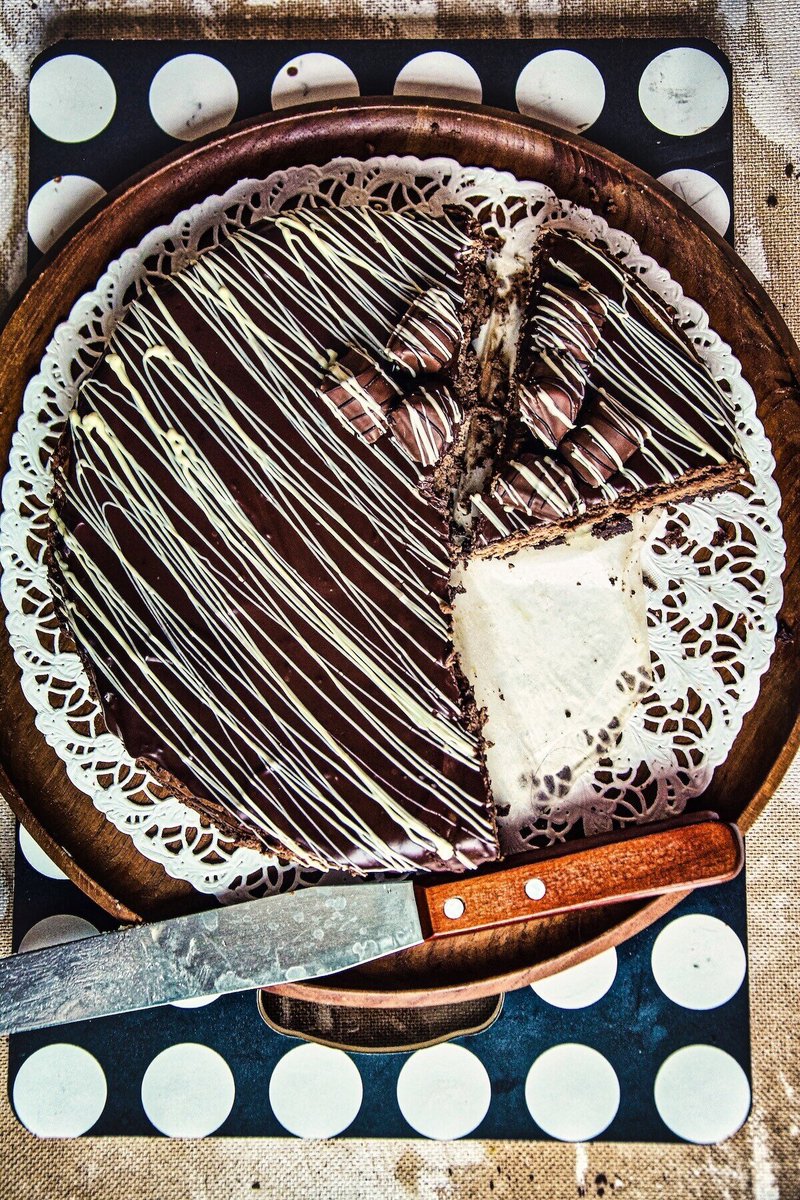 Chocolate Cheesecake with chocolate ganache topping and chocolate cookie crust viewed from above
