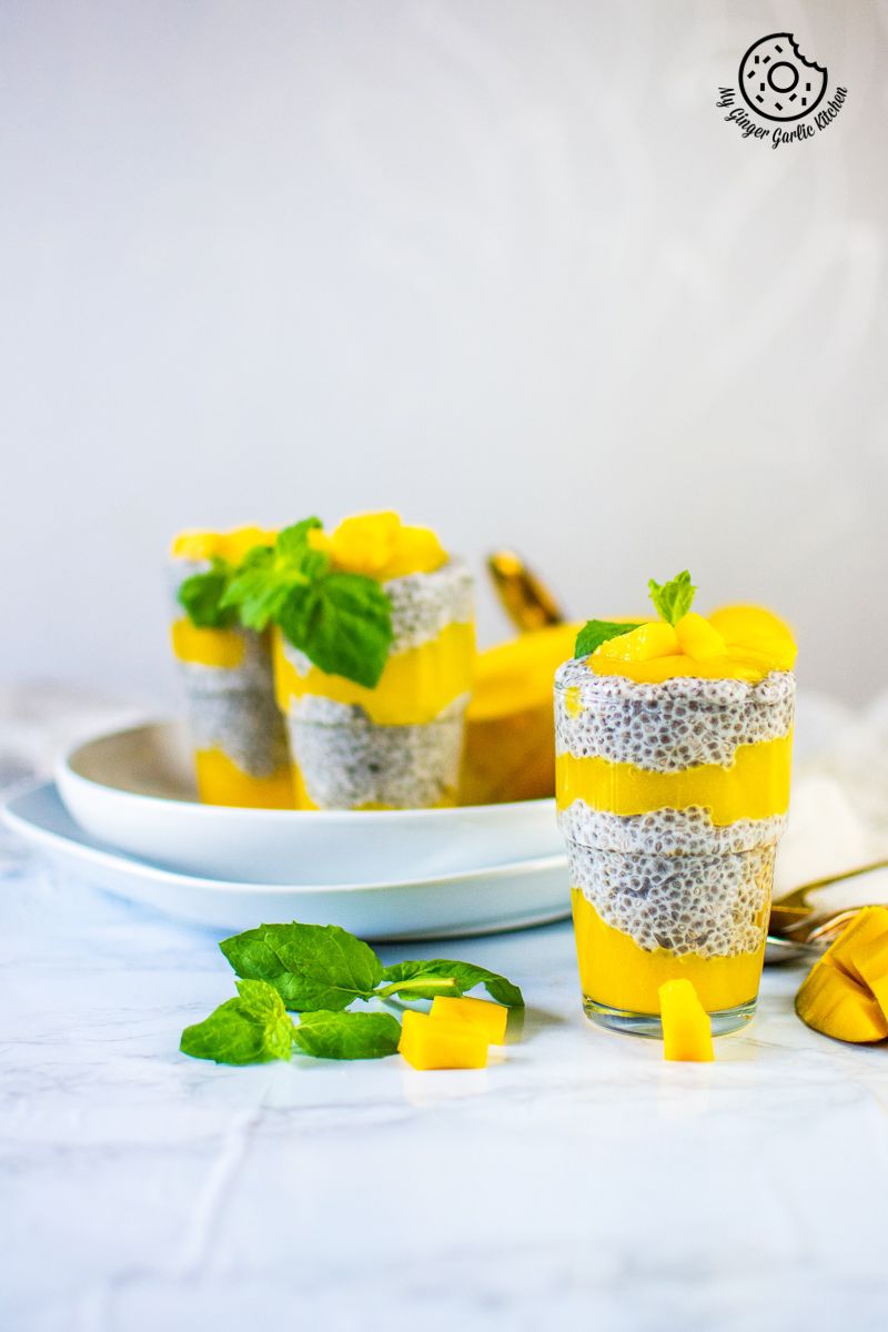 coconut mango chia pudding served in a glass