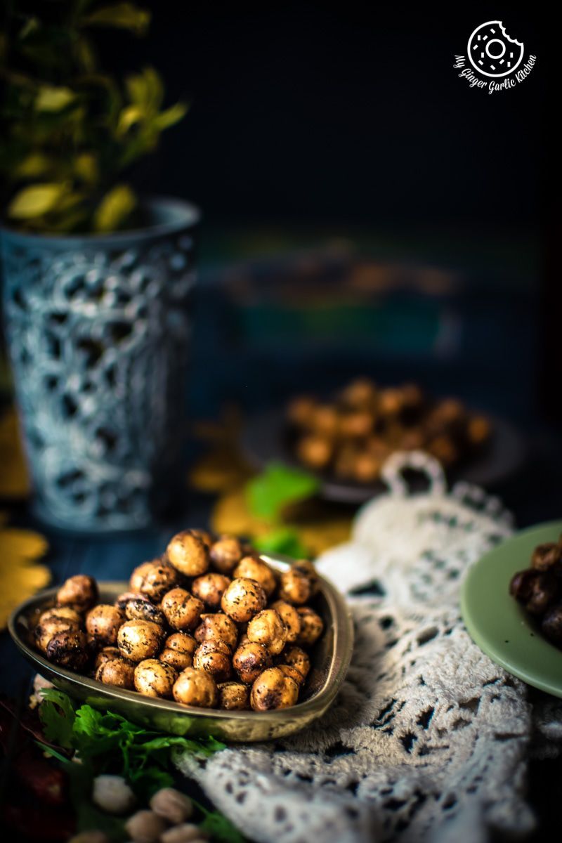 there are a lot of crispy chana on a table with a vase of flowers