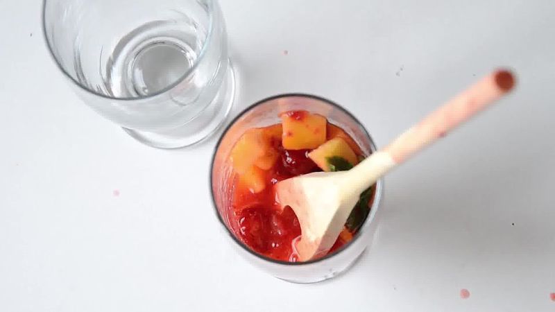 Image of the recipe cooking step-2-1 for Dark Rum Strawberry Mango Mojito Recipe