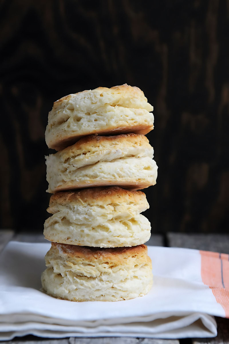 a close up of a stack of biscuits on a napkin