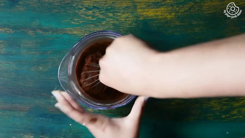 Image of the recipe cooking step-1-2 for Eggless Chocolate Hazelnut Ice Cream