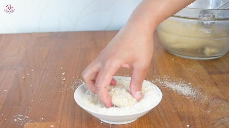 Image of the recipe cooking step-1-10 for Eggless Coconut Cookies