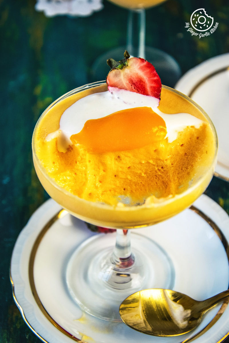 eggless mango mousse served in dessert glasses
