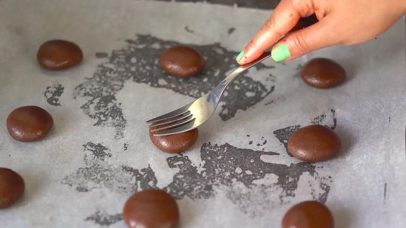 Image of the recipe cooking step-1-8 for  3-Ingredient Eggless Nutella Cookies