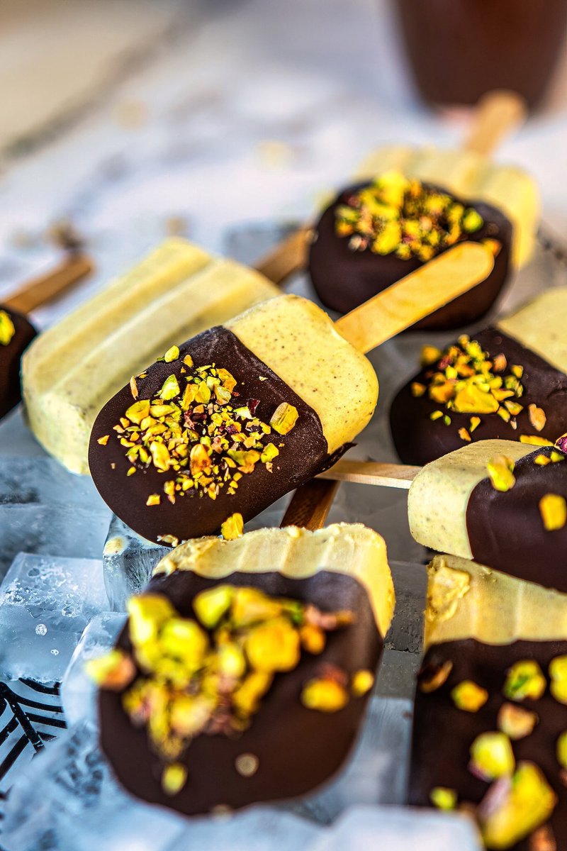 Chocolate dipped pistachio ice cream bars with creamy Greek yogurt pistachio filling and crunchy roasted pistachios