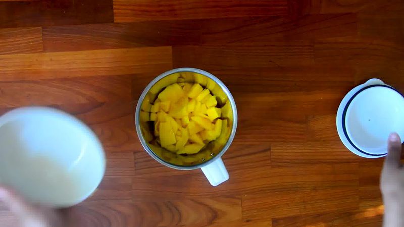 Image of the recipe cooking step-1-1 for Homemade Mango Ice Cream (No Ice Cream Maker)