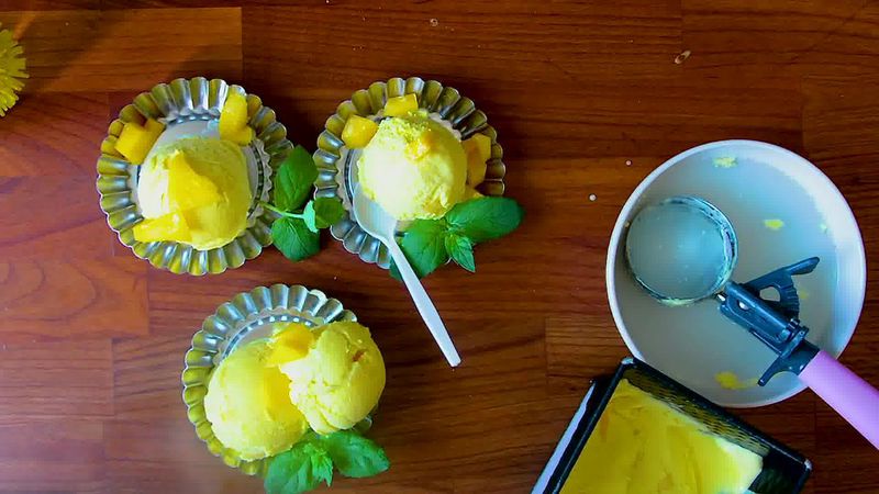 Image of the recipe cooking step-2-10 for Homemade Mango Ice Cream (No Ice Cream Maker)