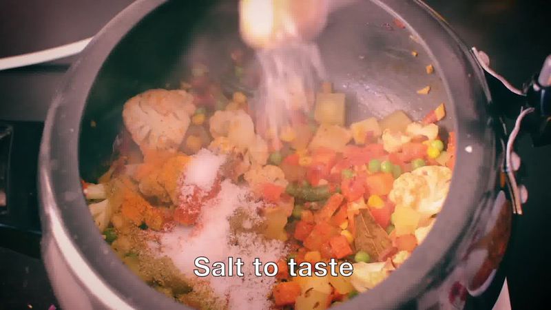 Image of the recipe cooking step-1-11 for How To Make Masala Khichdi (Vegetable Khichdi Recipe)