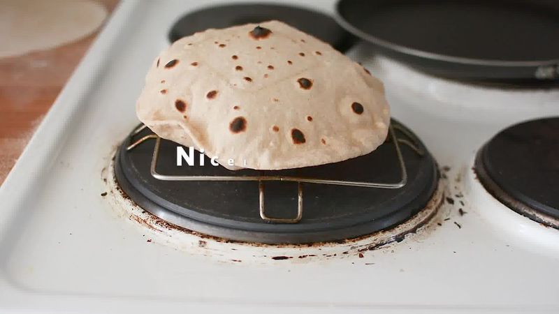 Image of the recipe cooking step-4-5 for Roti Recipe - How to Make Roti/Chapati