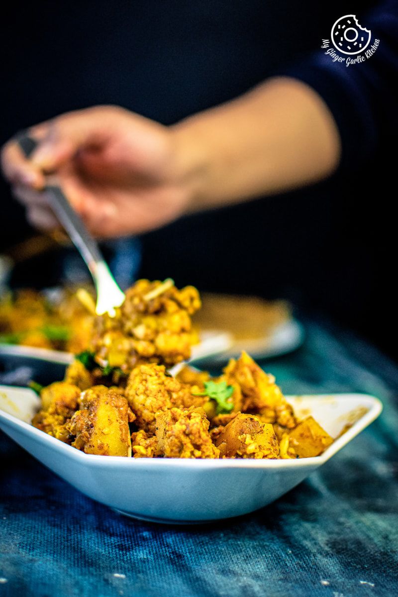 aloo gobi shot on blue wooden background