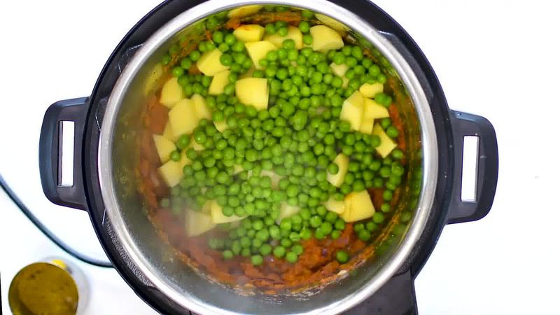 Image of the recipe cooking step-1-8 for Instant Pot Aloo Matar - Potato Peas Curry