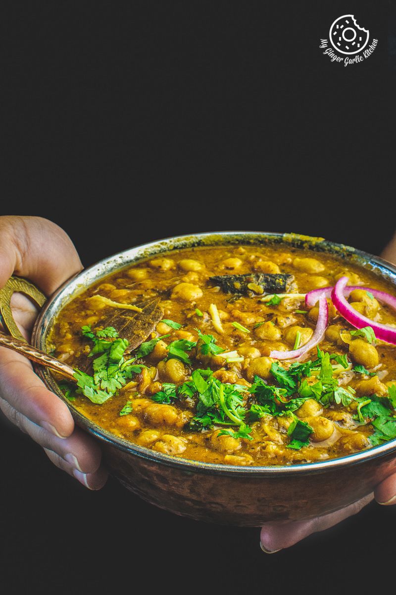 instant pot chana masala served in a copper bowl