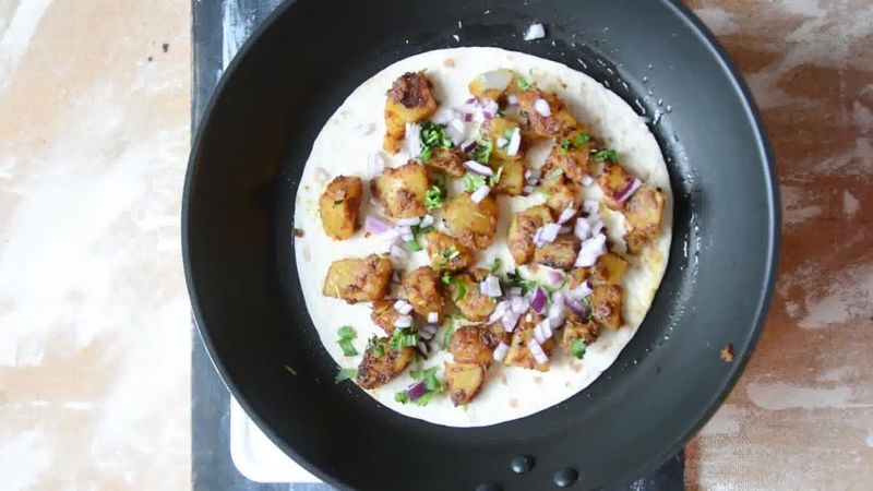 Image of the recipe cooking step-1-11 for Jeera Aloo Quesadilla