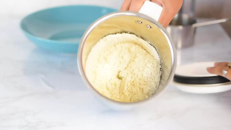 Image of the recipe cooking step-1-1 for Kaju Pista Roll Recipe - Cashew Pistachio Fudge