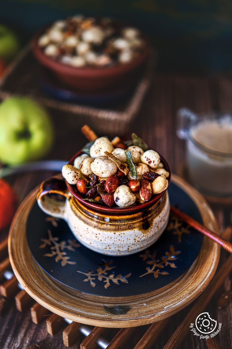 makhana namkeen chivda in a white brown ceramic pot