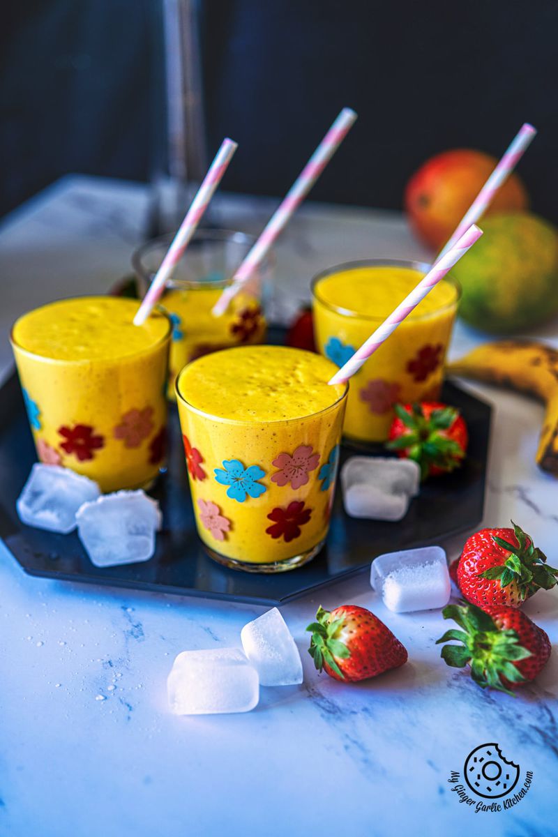 mango smoothie in floral glasses