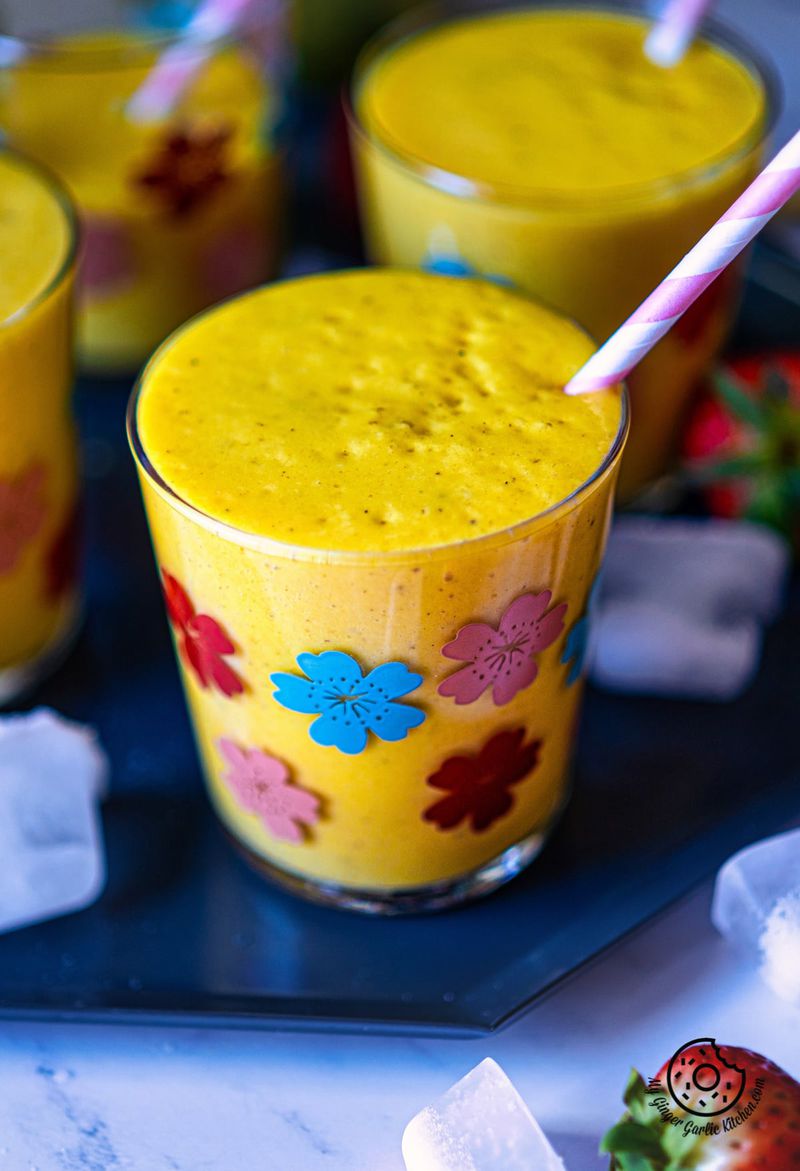closeup shot of a chilled mango smoothie glass