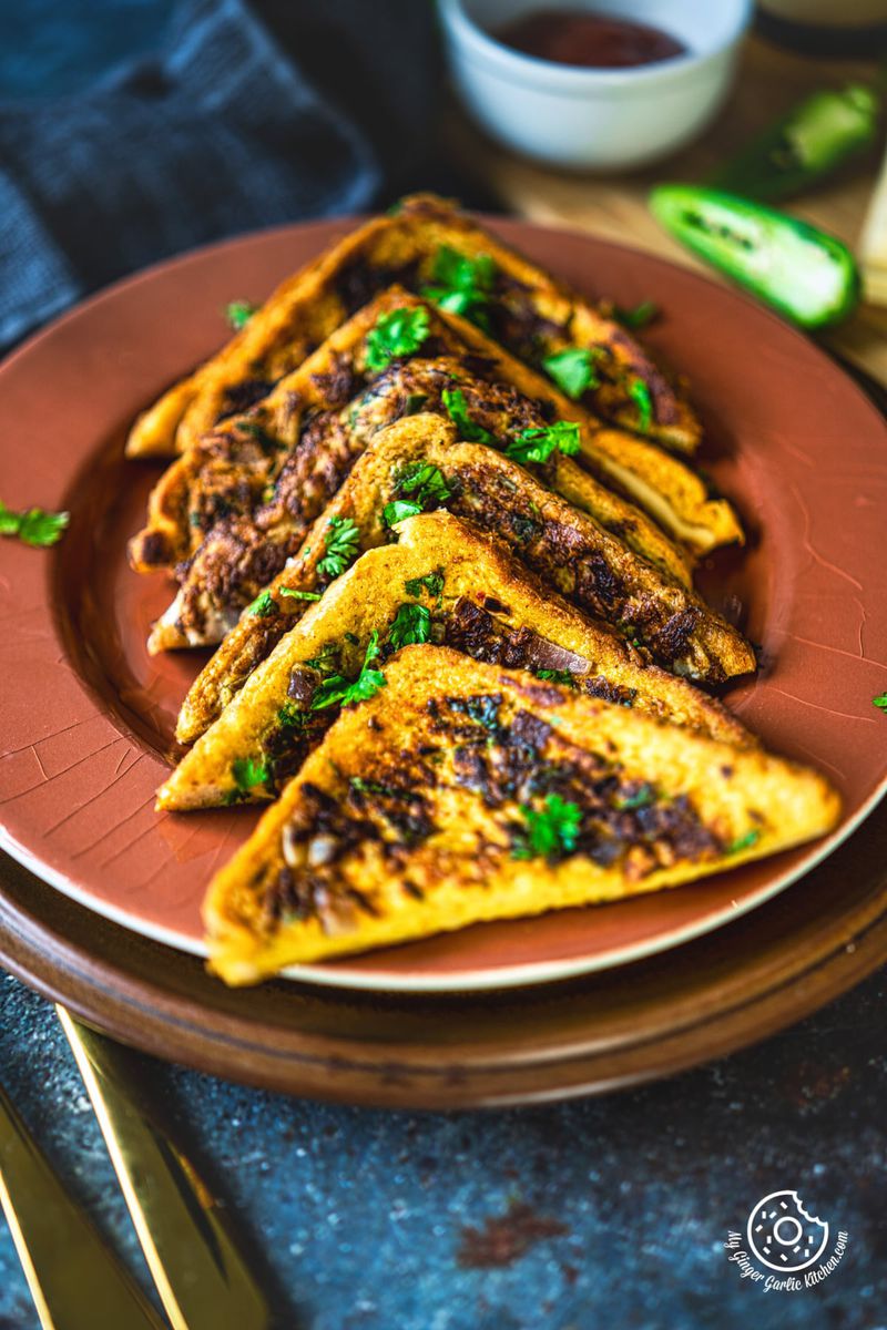 closeup shot of masala french toast in brown toast