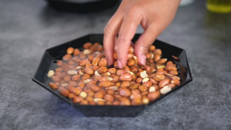 Image of the recipe cooking step-1-2 for Masala Peanuts (Air Fryer, Baked and Fried Recipe)