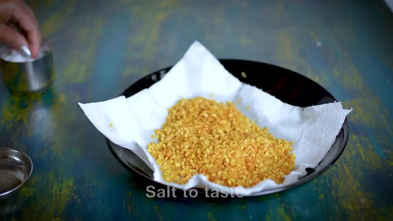 Image of the recipe cooking step-2-4 for Moong Dal Namkeen - Salted Crunchy Fried Moong Dal Snack