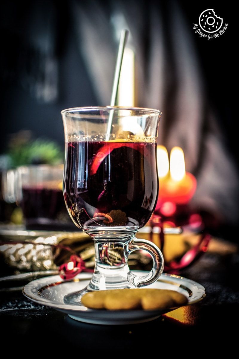 warm mulled wine served in a transparent tall glass