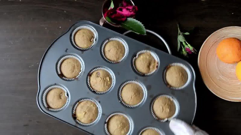 Image of the recipe cooking step-4-3 for Oats Orange Eggless Muffins 3 Ways (Video)