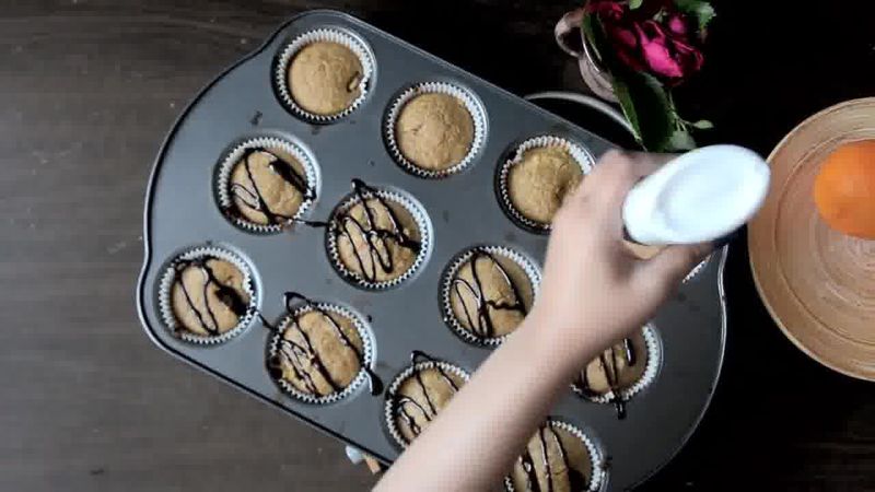Image of the recipe cooking step-4-4 for Oats Orange Eggless Muffins 3 Ways (Video)