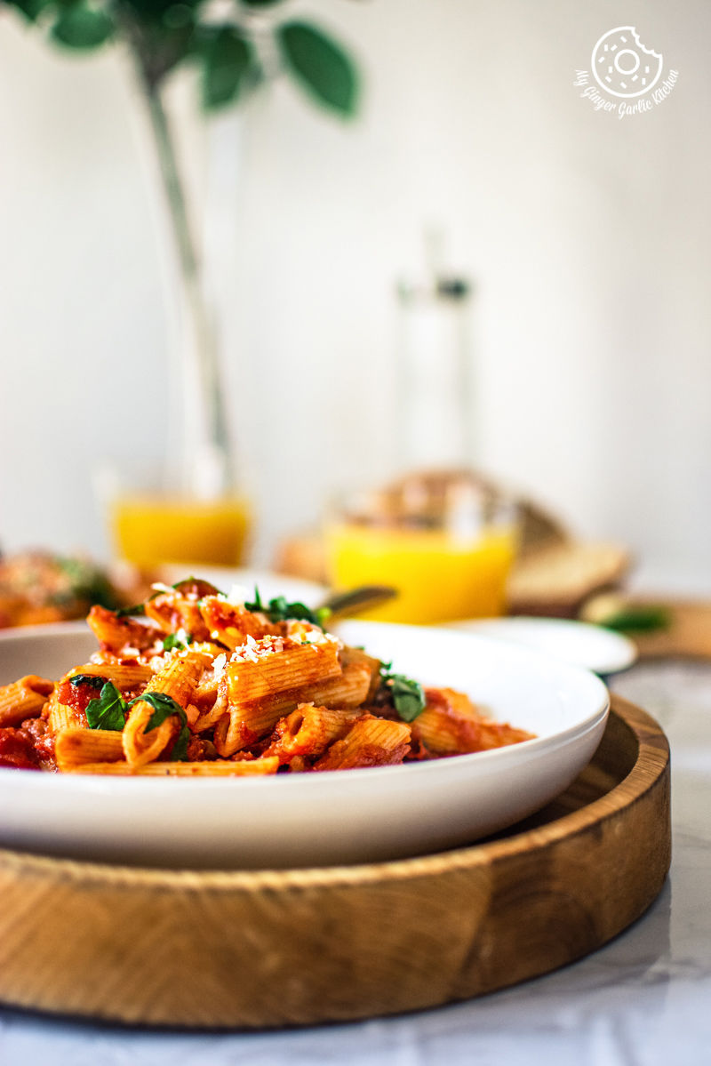 pasta arrabiata served in a white plate