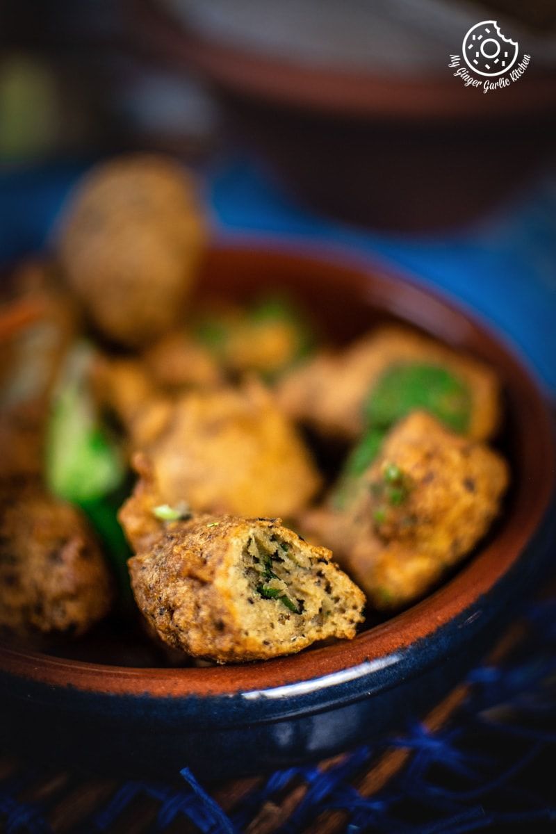 a bowl of paush vada that is sitting on a table